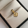 Dije Trebol Diamantado Oro amarillo 18k 0,55 Gr / 9,3 mm / 1,6 Cm