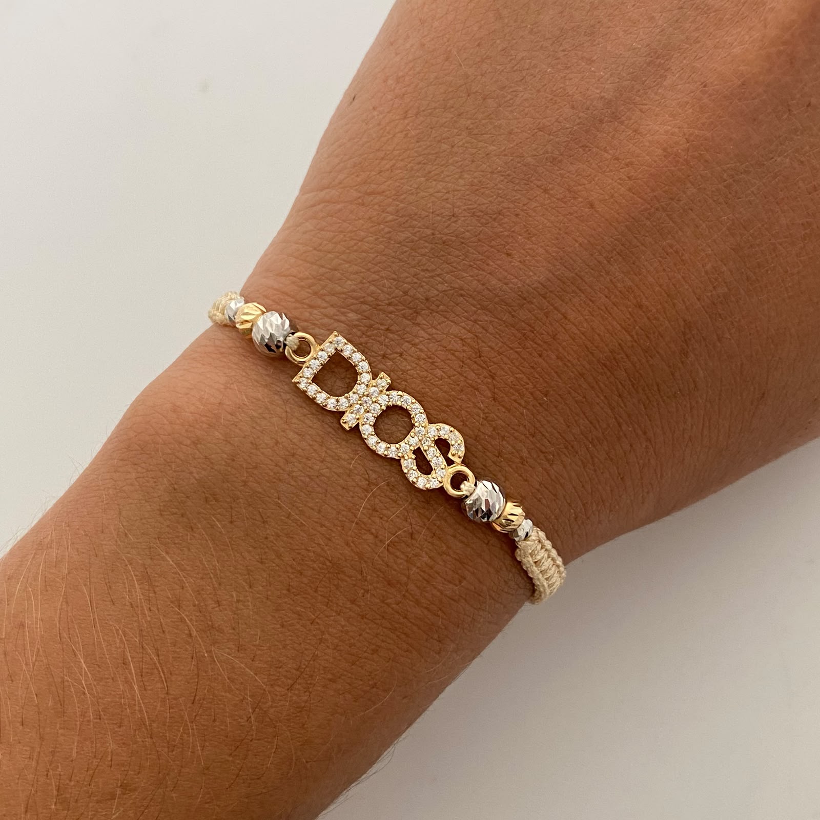 Pulsera tejida Dios Casting Bolas diamantadas 5,4,3mm  Oro amarillo y Oro blanco 18k 1,55 Gr