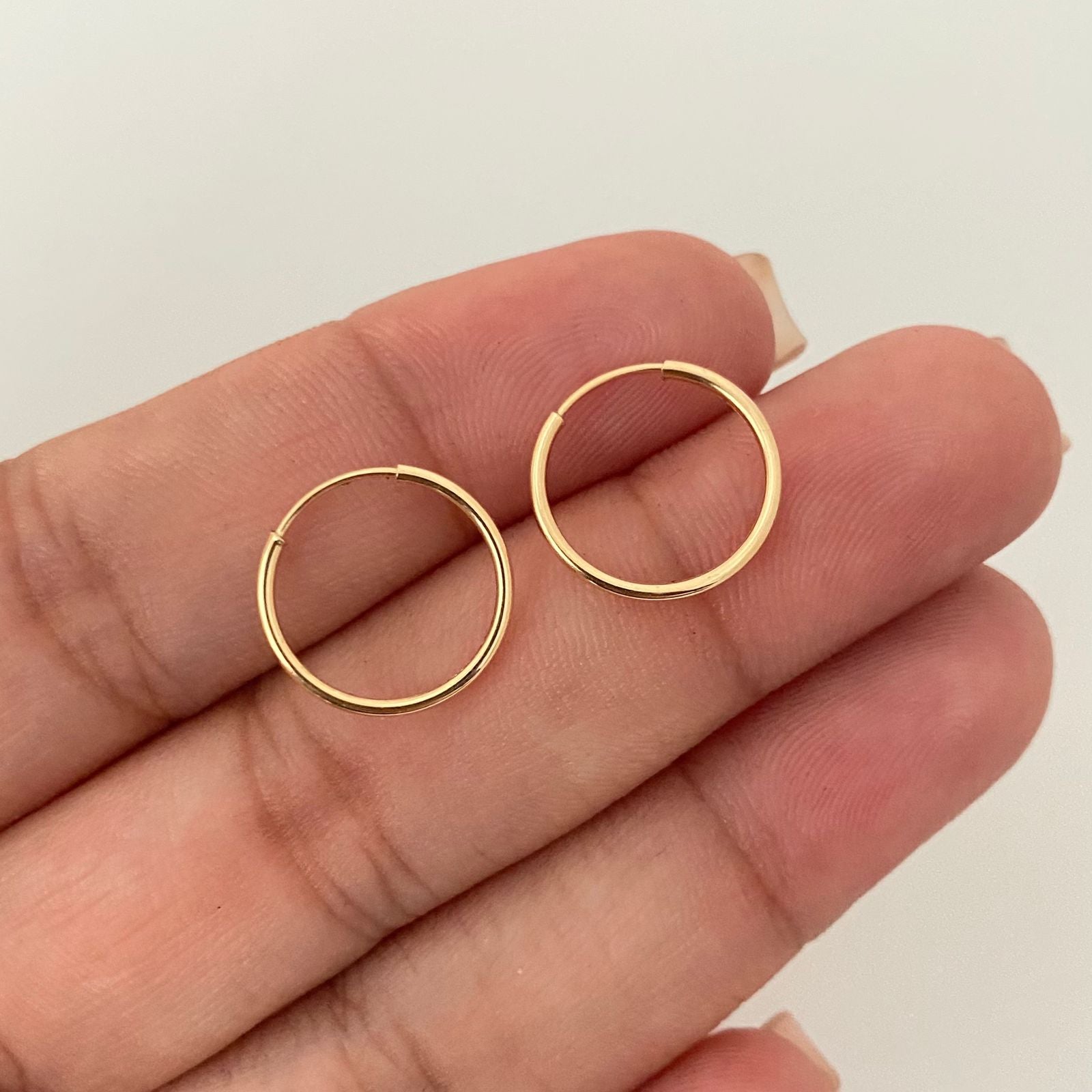 Candonga imperdible lisa Oro amarillo 18k 0,65 Gr / 1,3 Cm