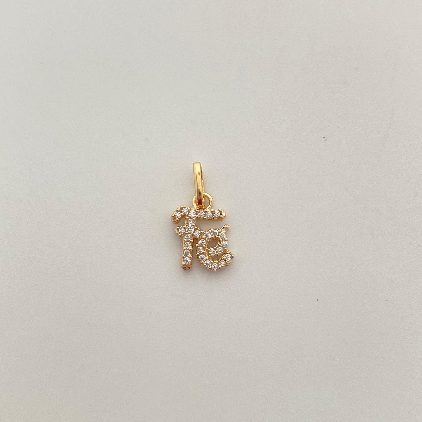 Dije fé con circones blancos  Oro amarillo 18k 0,85 Gr / 7,94 mm / 1,6 Cm