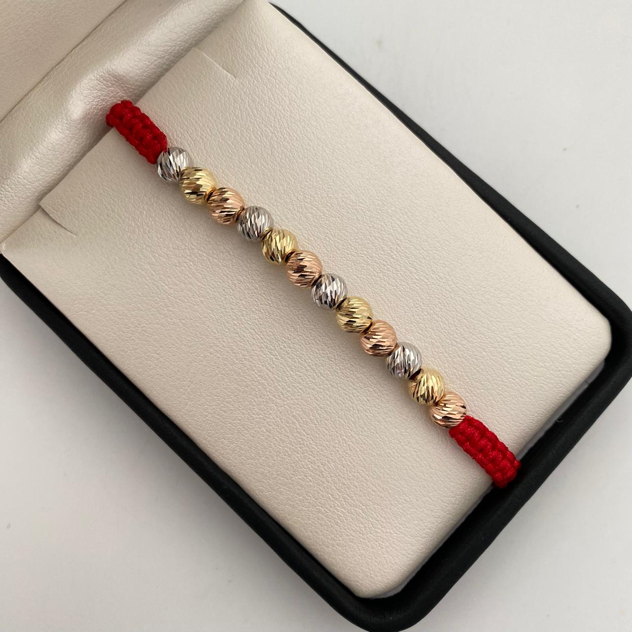 Pulsera tejida con balines diamantados 6mm  Tres oros 18k 2,55 Gr