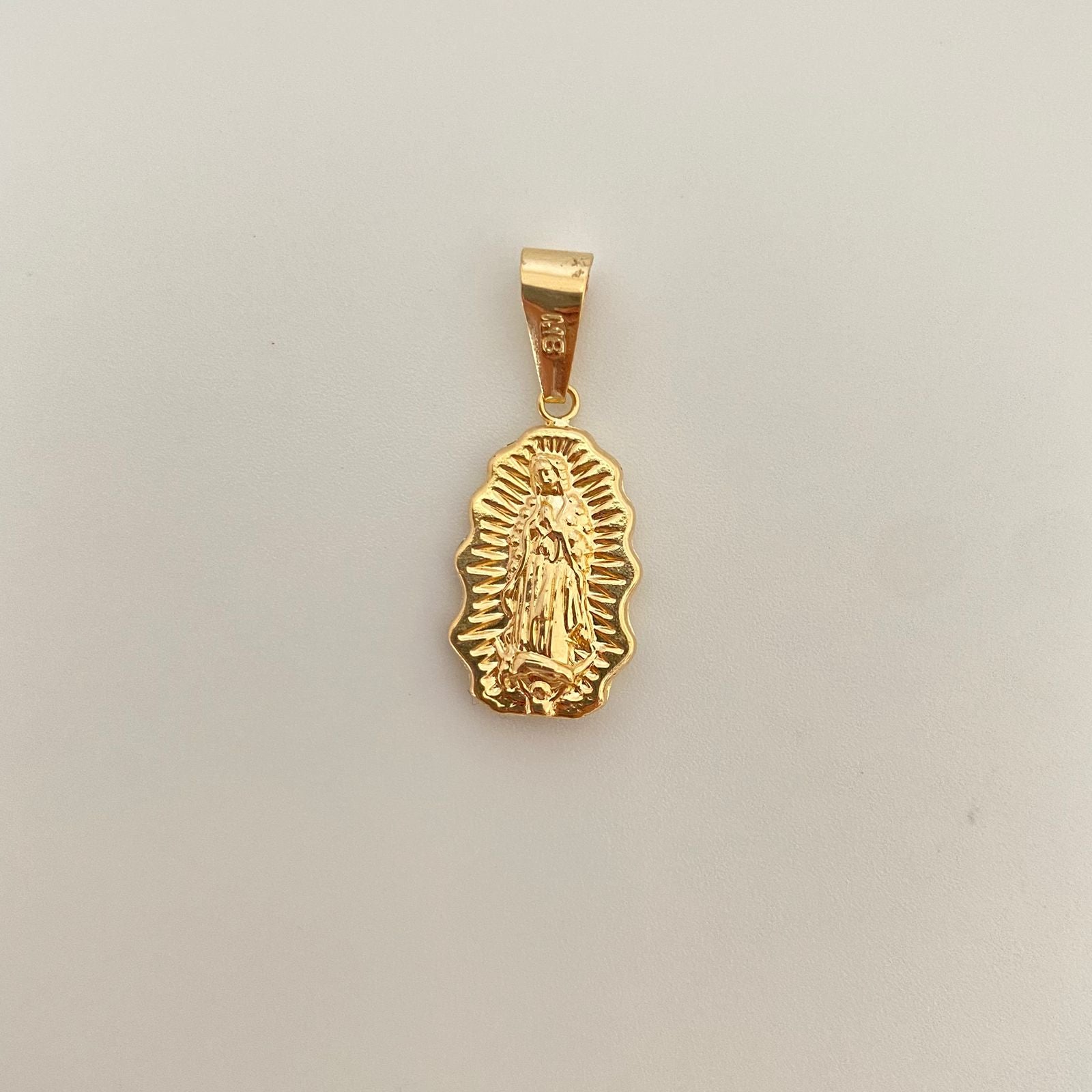 Dije silueta guadalupe troquel Oro amarillo 18k 1,35 Gr / 3,0 Cm