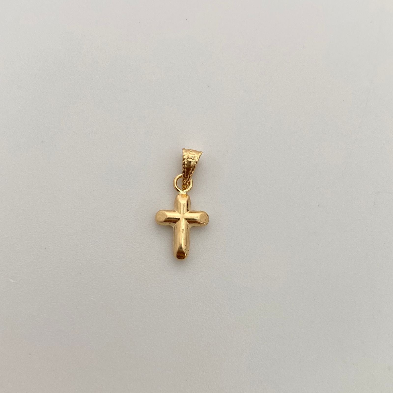 Dije Cruz Oro amarillo 18k 0,3 Gr / 7,3 mm / 1,5 Cm
