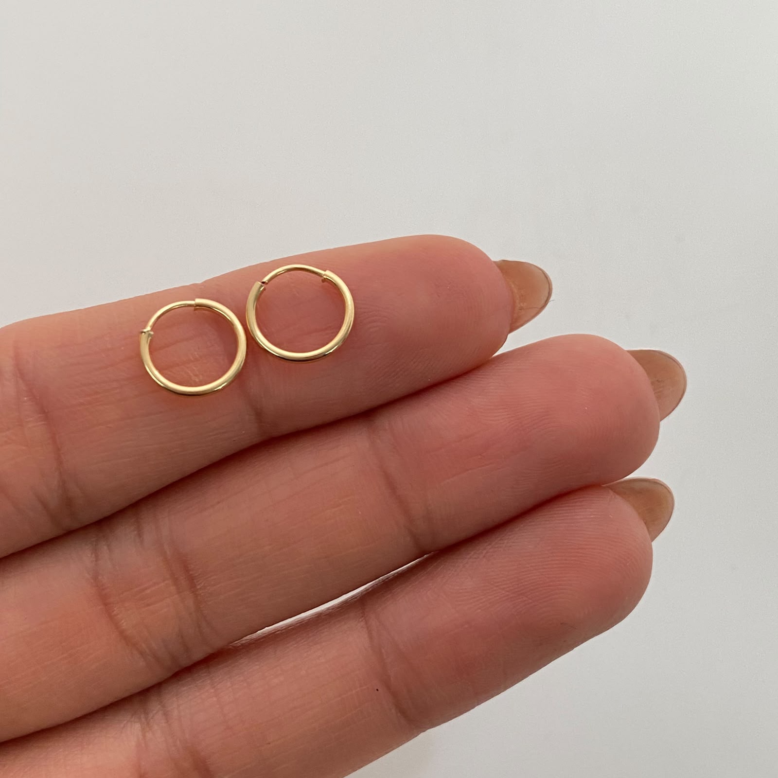 Candonga imperdible lisa Oro amarillo 18k 0,4 Gr / 0,8 Cm