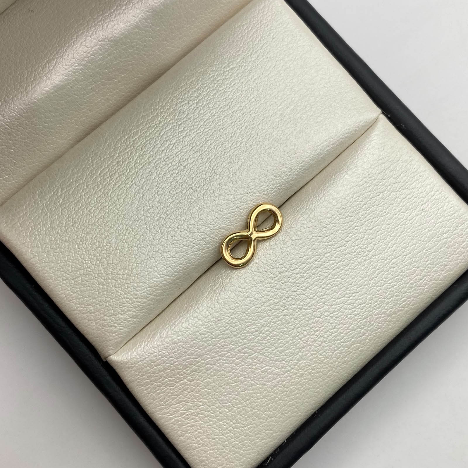 Herraje infinito Oro amarillo 18k 0,45 Gr / 1,5 Cm