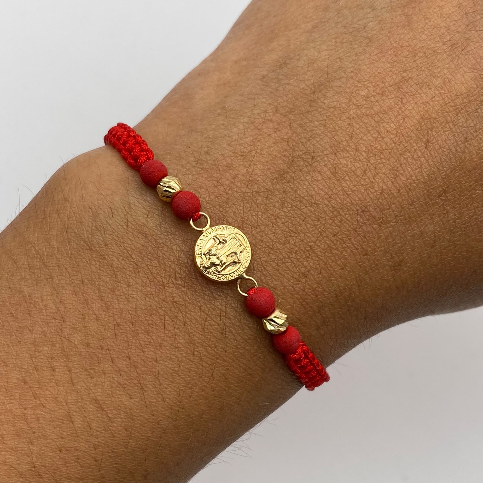 Pulsera tejida herraje san benito bolas diamantadas 4mm Oro amarillo 18k 0,5 Gr