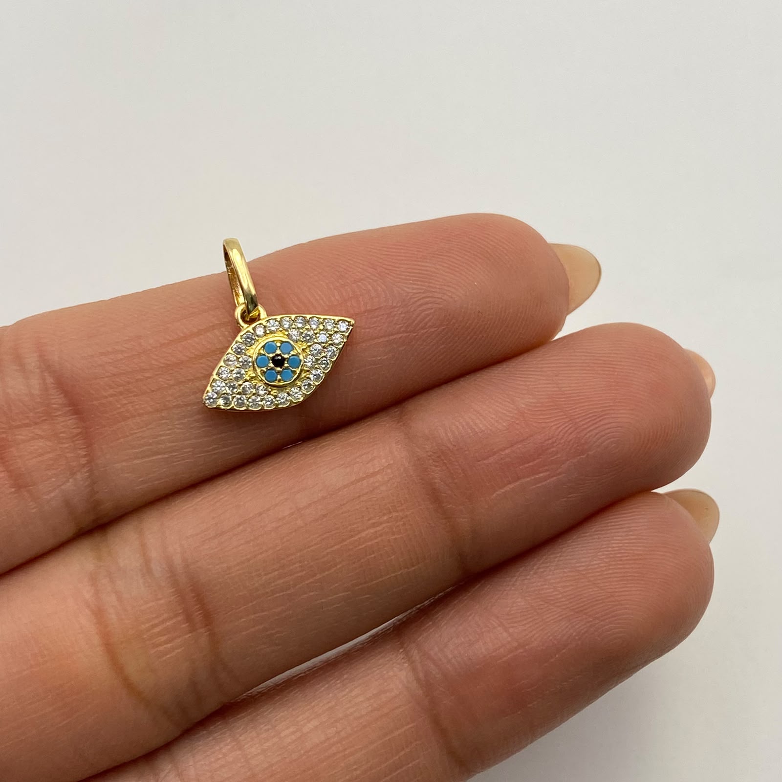 Dije Ojo turco casting Oro amarillo 18k 1,1 Gr / 13,4 mm / 1,4 Cm