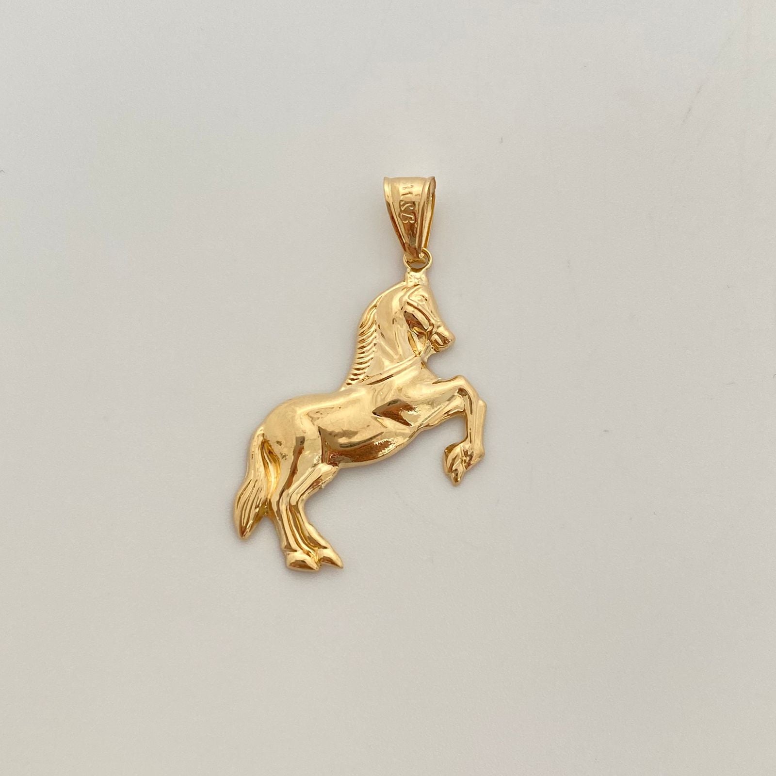 Dije caballo  Oro amarillo 18k 1,85 Gr / 26,53 mm / 4 Cm