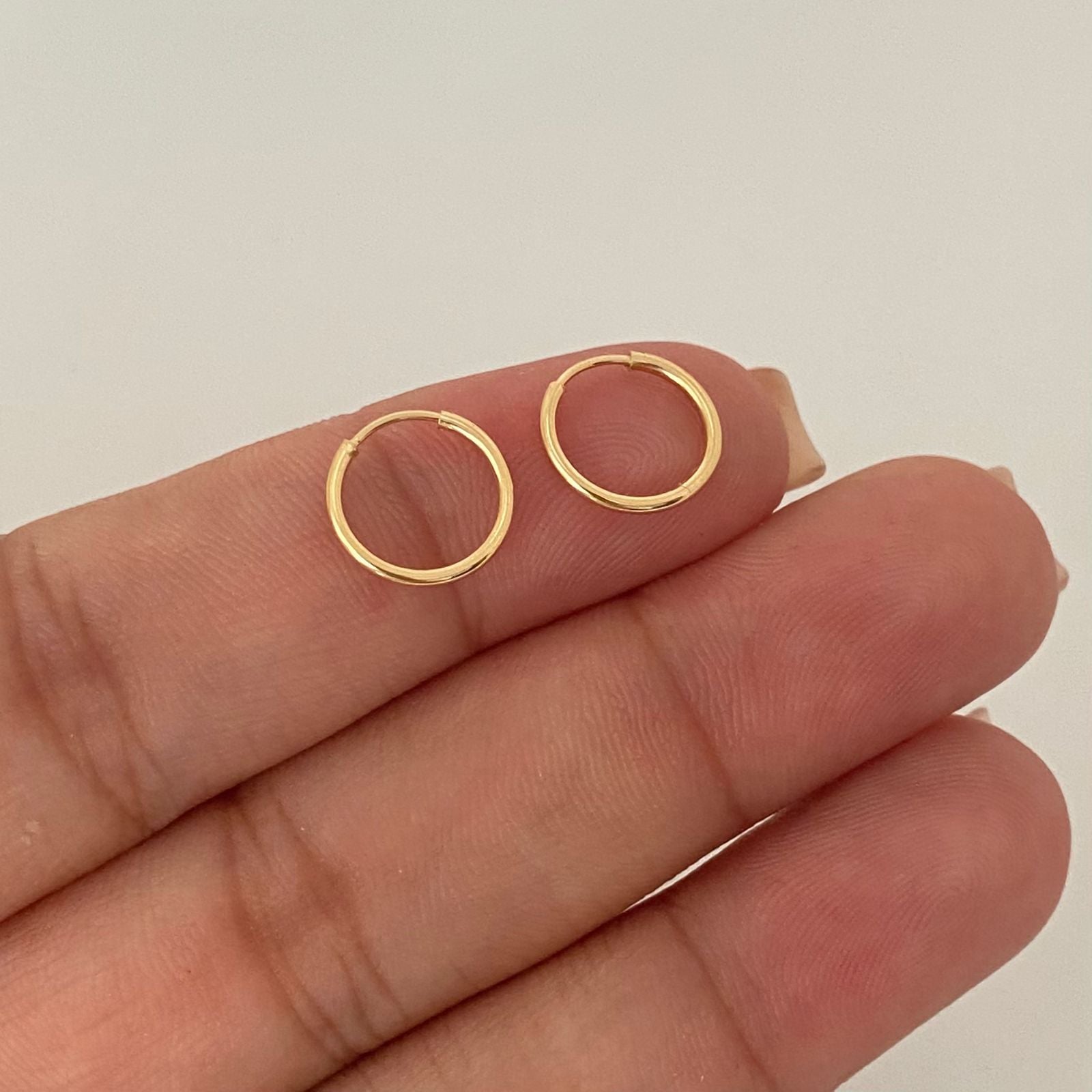 Candonga imperdible lisa Oro amarillo 18k 0,40 Gr / 1,0 Cm