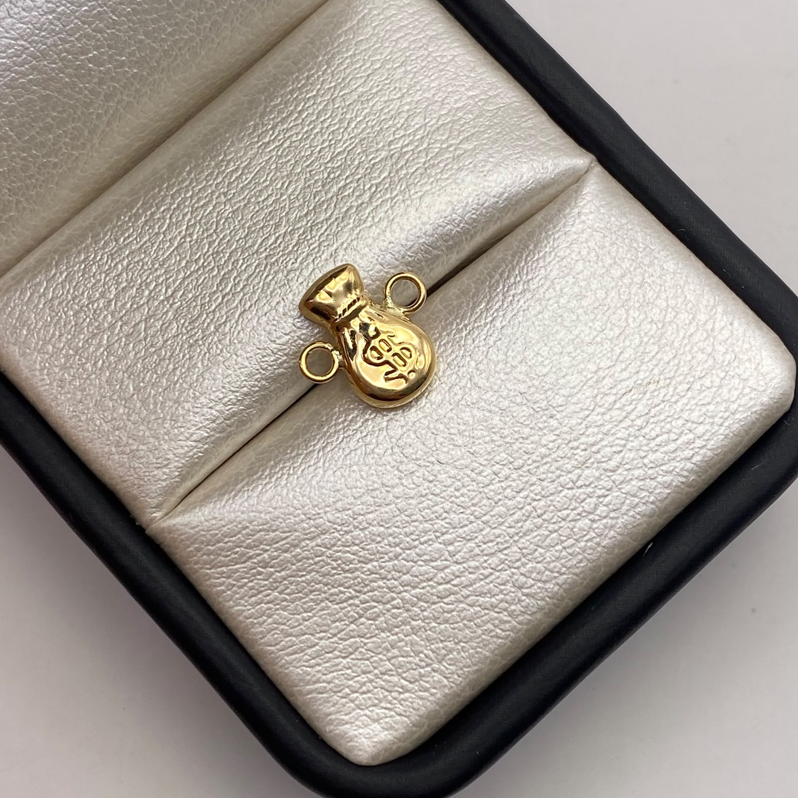 Herraje bolsa dinero Oro amarillo 18k 0,45 Gr