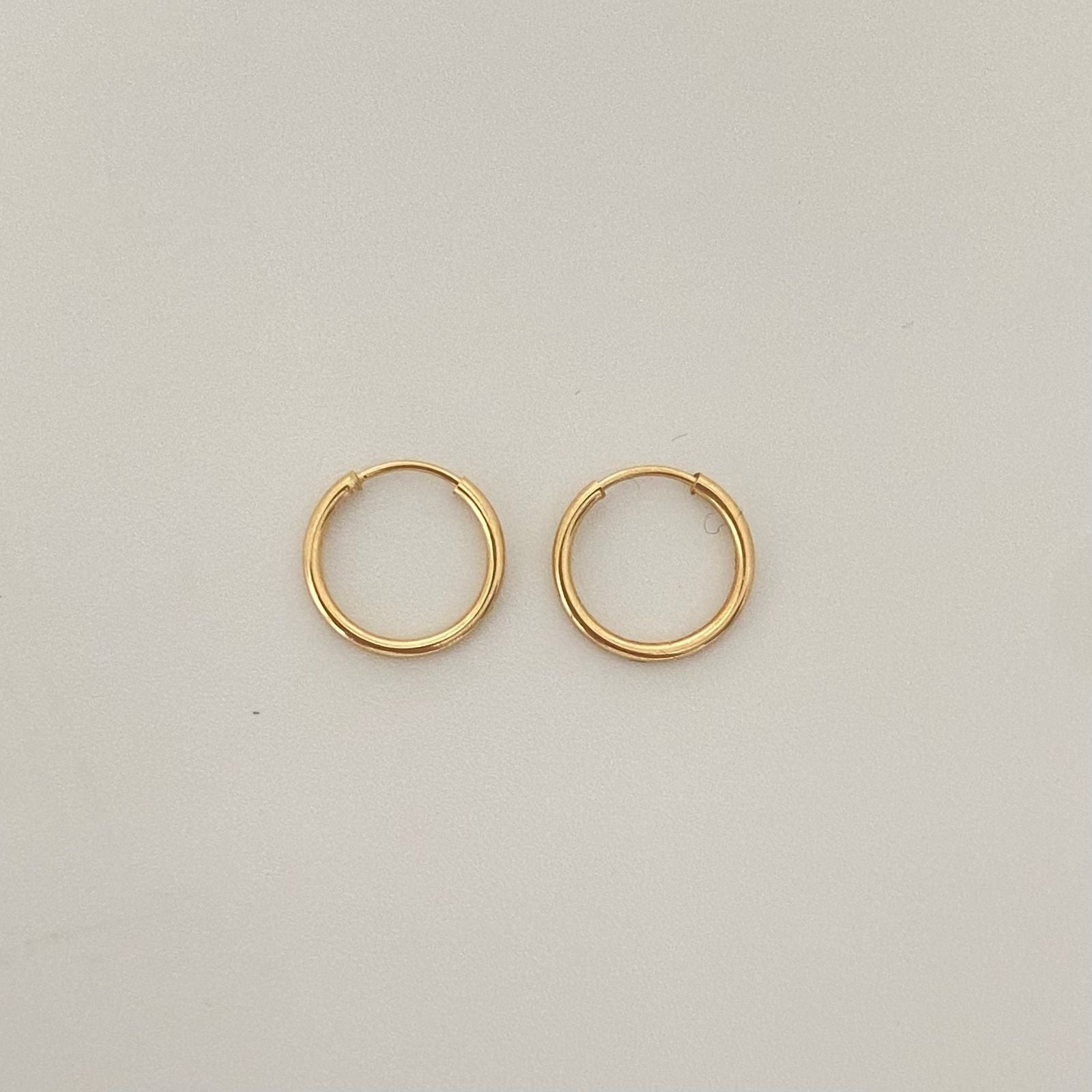 Candonga imperdible lisa Oro amarillo 18k 0,45 Gr / 1,0 Cm